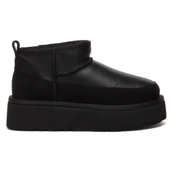 EverUgg Earlova UGG boots in classic shearling-lined design with suede exterior and cozy fur lining.