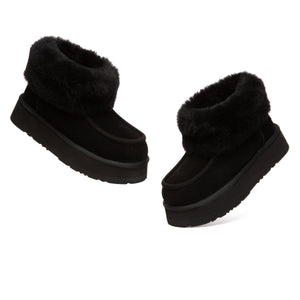 EverUgg Loofee UGG boots in plush, tan suede with shearling lining, showcasing their cozy and stylish design.
