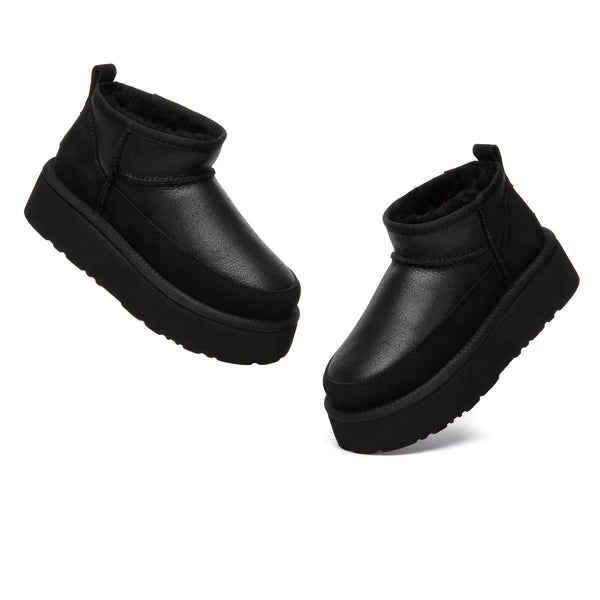 EverUgg Earlova UGG boots in classic shearling style, showing beige suede exterior and cozy interior lining.