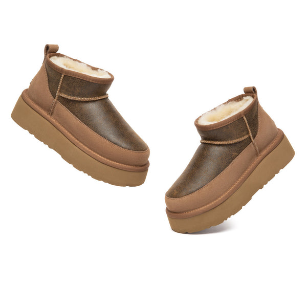EverUgg Earlova UGG boots in classic tan with plush sheepskin lining and durable rubber soles, shown on a plain background.