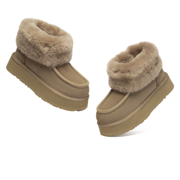 EverUgg Loofee UGG boots in brown leather with soft shearling lining, stylish ankle-length footwear for cold weather.