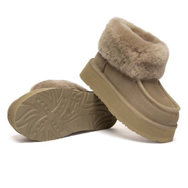 EverUgg Loofee UGG boots in plush, cozy shearling with tan leather exterior and rugged rubber sole, perfect for winter wear.